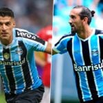 Foto com Luis Suárez (E) e Hernán Barcos (D) comemorando seus gols pelo Grêmio